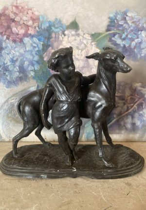 Sculpture en Régule – “L’Enfant au Chien” – debut  du XXe siècle