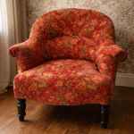 Fauteuil crapaud Napoléon III – ancien tapissé en méthode traditionnelle – Tissu fleuri rouge