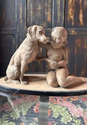 Sculpture Art déco la petite fille au chien en plâtre patine signé Mélani